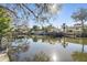 Enjoy beautiful water views and waterfront living at 8721 Old Post Rd, Port Richey, FL 34668