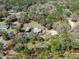 Aerial view showcasing the boundaries of the property and its surrounding nature at 9382 Wild Horse Trl, Brooksville, FL 34601