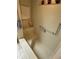 Tiled shower stall with grab bar for accessibility and safety at 11121 Linkside Dr # 11121, Port Richey, FL 34668