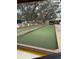 Enjoy a well-maintained bocce ball court surrounded by benches and lush greenery at 11121 Linkside Dr # 11121, Port Richey, FL 34668