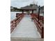 Scenic pier on the water, offering a tranquil spot with benches and a covered gazebo at 11121 Linkside Dr # 11121, Port Richey, FL 34668