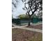Fenced in outdoor tennis courts available for the residents of the Timber Oaks community at 11121 Linkside Dr # 11121, Port Richey, FL 34668