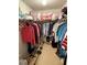 Spacious walk-in closet providing ample storage with shelving and hanging space at 11121 Linkside Dr # 11121, Port Richey, FL 34668