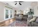 Open-concept living room flows seamlessly into the kitchen, creating a spacious and inviting atmosphere at 11227 Lakeview Dr, New Port Richey, FL 34654