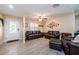Spacious living room with comfortable seating, stylish decor, and ample natural light, perfect for Gathering gatherings at 120 Read St, Tarpon Springs, FL 34689