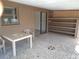 Covered Florida room offering a tiled floor and natural light at 12716 Mulberry Ln, Hudson, FL 34667