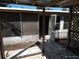 Back patio with covered roof and mosaic tile at 12716 Mulberry Ln, Hudson, FL 34667