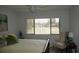 Bedroom with views of the golf course, ensuring comfortable relaxation and a great outdoor vista at 12816 Wedgewood Way # D, Hudson, FL 34667