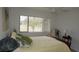 Bedroom offering scenic views, comfortable decor, and warm ambiance for a restful retreat at 12816 Wedgewood Way # D, Hudson, FL 34667