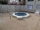 Community hot tub offers the residents a private spa experience for relaxation and rejuvenation at 12816 Wedgewood Way # D, Hudson, FL 34667