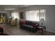 Inviting living room featuring lots of natural light and tile floors at 12816 Wedgewood Way # D, Hudson, FL 34667