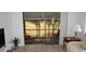 View from living room to screened porch and golf course at 12816 Wedgewood Way # D, Hudson, FL 34667