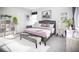 Bright bedroom with a modern design, featuring a comfortable bed and stylish decor at 13186 Road Runner Ave, Weeki Wachee, FL 34614