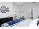 Spacious bedroom showcasing the ensuite bathroom, closet, and modern finishes at 13186 Road Runner Ave, Weeki Wachee, FL 34614