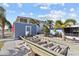 Backyard with boat dock and landscaping at 13604 Maria Dr, Hudson, FL 34667