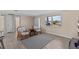 Spacious living room with wood-look floors, neutral walls, and comfortable seating offers relaxation at 13604 Maria Dr, Hudson, FL 34667