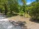 A beautiful lot with mature trees offers a serene setting, with ample space for building a custom home in a desirable location at 16284 Sandusky St, Brooksville, FL 34604