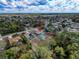 Aerial view of the home and neighborhood, showcasing the location and surrounding greenery at 2165 Bolger Ave, Spring Hill, FL 34609