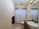 Functional bathroom with a shower, sink, and neutral color scheme, offering a clean and practical space at 2165 Bolger Ave, Spring Hill, FL 34609