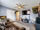 Unique bedroom with a ceiling fan, wall decor, and comfortable furnishings creating a cozy and personalized space at 2165 Bolger Ave, Spring Hill, FL 34609