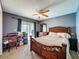 Spacious bedroom with stylish carpet and natural light from the sliding glass door at 2165 Bolger Ave, Spring Hill, FL 34609