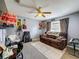 Bonus Room with couch and guitars at 2165 Bolger Ave, Spring Hill, FL 34609