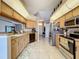 Well-lit kitchen features modern stainless steel appliances and plenty of counter space at 2165 Bolger Ave, Spring Hill, FL 34609