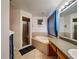 Main bathroom boasts an garden tub and a glass enclosed shower stall at 2165 Bolger Ave, Spring Hill, FL 34609