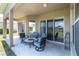 Outdoor patio with cozy seating, perfect for relaxation and entertaining at 2330 Tarragon Ln, New Port Richey, FL 34655