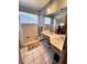 Bathroom features step-in shower and bright light at 2630 63Rd S Ave, St Petersburg, FL 33712
