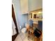 Cozy bathroom features a cabinet over toilet at 2630 63Rd S Ave, St Petersburg, FL 33712