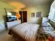 Bedroom with TV and ample natural light at 2630 63Rd S Ave, St Petersburg, FL 33712