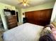 Spacious bedroom with ample closet space, a ceiling fan, and a dresser at 2630 63Rd S Ave, St Petersburg, FL 33712