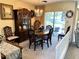 Elegant dining room featuring a beautiful chandelier, ample natural light, and stylish decor at 2630 63Rd S Ave, St Petersburg, FL 33712