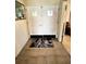Tile entryway showcasing the double front doors and patterned welcome mat at 2630 63Rd S Ave, St Petersburg, FL 33712