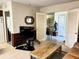 Open living room with tile floors, wooden coffee table, and multiple doorways at 2630 63Rd S Ave, St Petersburg, FL 33712