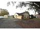 This house includes a driveway, shed and brick accents at 29341 Rhodin Pl, Wesley Chapel, FL 33545