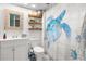Bathroom featuring a vanity, shiplap walls, and a decorative turtle shower curtain at 3251 Shoal Line Blvd, Hernando Beach, FL 34607