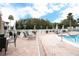 View of the community pool and lounging area at 3629 Muirfield Ct # 3629, New Port Richey, FL 34655