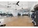 Spacious gym featuring various exercise equipment and ample floor space for workouts at 4142 Montegrappa Way, Wesley Chapel, FL 33543