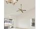 Bright and airy living room with neutral paint, ceiling fan and vaulted ceiling at 4208 Boston Cir, New Port Richey, FL 34653