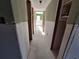 Hallway featuring view of exterior door at 4557 Garnet Dr # 101, New Port Richey, FL 34652