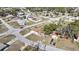 Located on a corner lot, this home has a pool area, mature landscaping, and convenient street access at 4560 Lamson Ave, Spring Hill, FL 34608