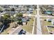 This aerial shot shows the pool and yard, with easy street access and community feel at 4560 Lamson Ave, Spring Hill, FL 34608