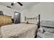 Bedroom features a comfortable queen bed, dresser, and attached closet at 4560 Lamson Ave, Spring Hill, FL 34608