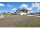Residential property with a garage, driveway, and well-maintained front lawn at 4560 Lamson Ave, Spring Hill, FL 34608