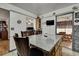 Open concept kitchen with breakfast bar and granite countertop at 4560 Lamson Ave, Spring Hill, FL 34608