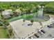 Breathtaking aerial view of a pristine beach area, turquoise waters, and convenient parking spaces at 6090 Waverly Rd, Weeki Wachee, FL 34607