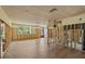 Unfinished living room featuring wood-look tile flooring and exposed framing at 6090 Waverly Rd, Weeki Wachee, FL 34607