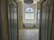 Spa-like bathroom with a freestanding tub and unique glass block window for natural light at 6393 Pinehurst Dr, Spring Hill, FL 34606